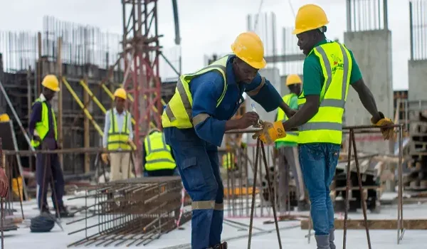 Serene Budigere Construction Status — RERA Under Process Site engineers reviewing development progress, representing the project timeline of Serene Budigere